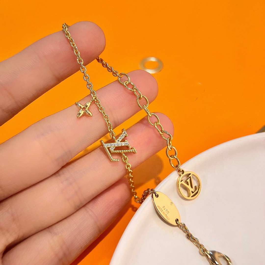 [Luxery]LOGO STAR MOTIF GOLD BRACELET