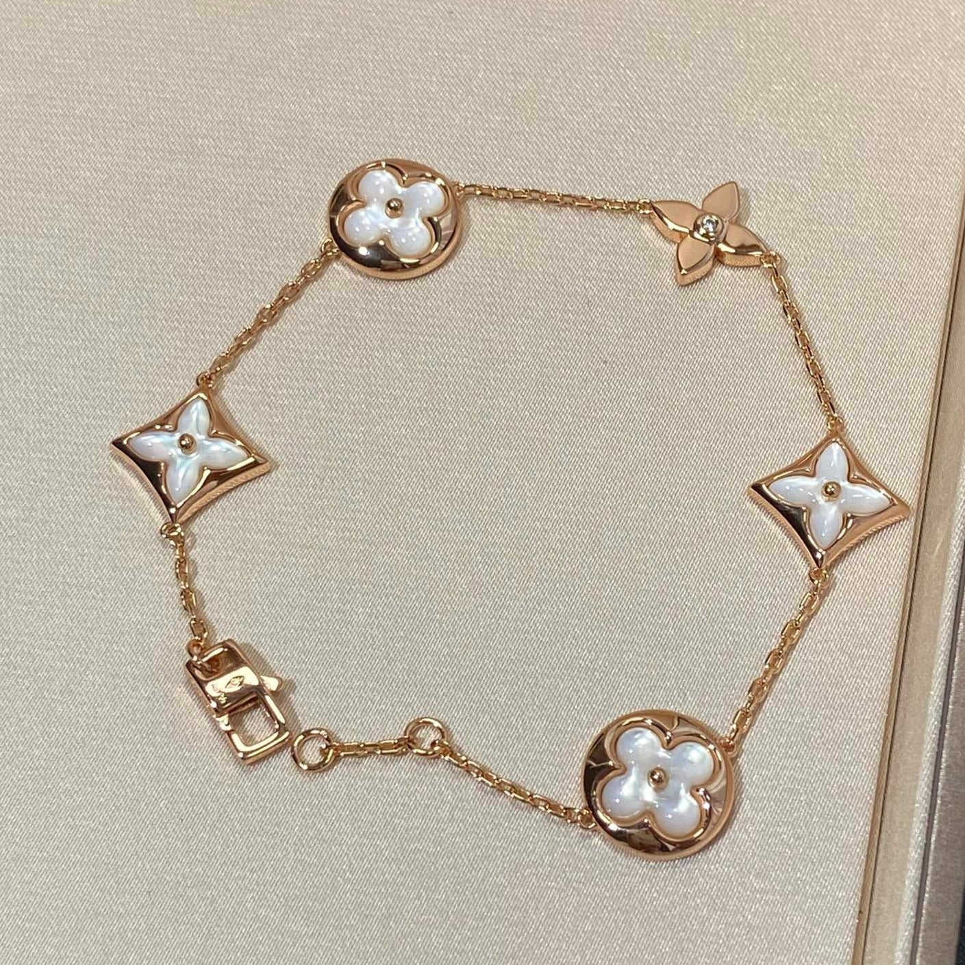 [Luxery]STAR AND SUN 5 MOTIF MOP PINK GOLD BRACELET