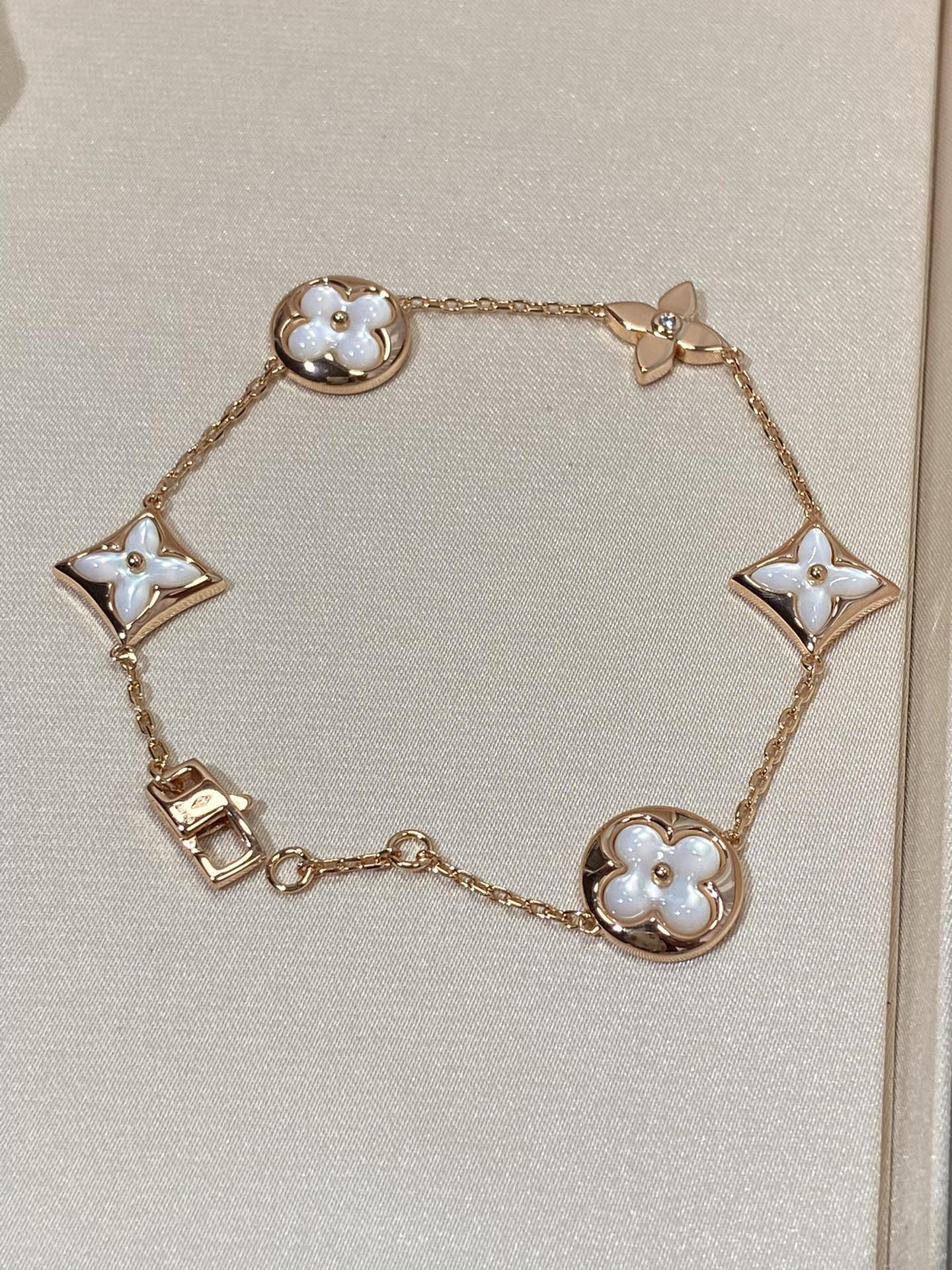 [Luxery]STAR AND SUN 5 MOTIF MOP PINK GOLD BRACELET
