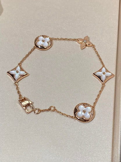 [Luxery]STAR AND SUN 5 MOTIF MOP PINK GOLD BRACELET