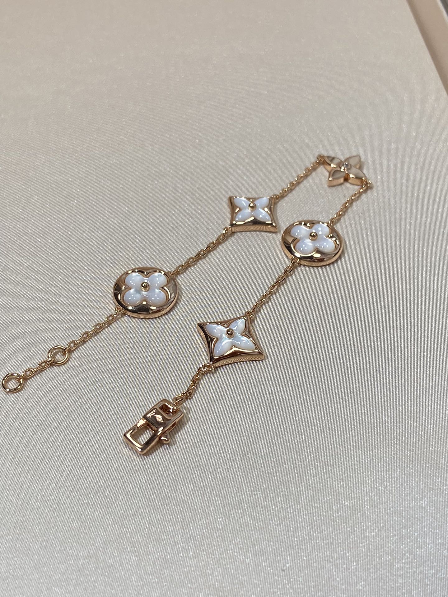 [Luxery]STAR AND SUN 5 MOTIF MOP PINK GOLD BRACELET