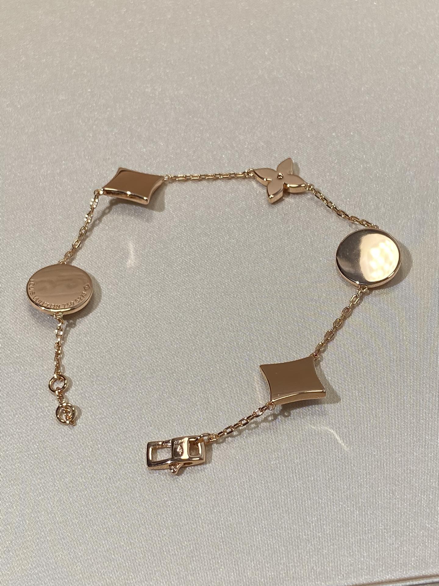 [Luxery]STAR AND SUN 5 MOTIF MOP PINK GOLD BRACELET