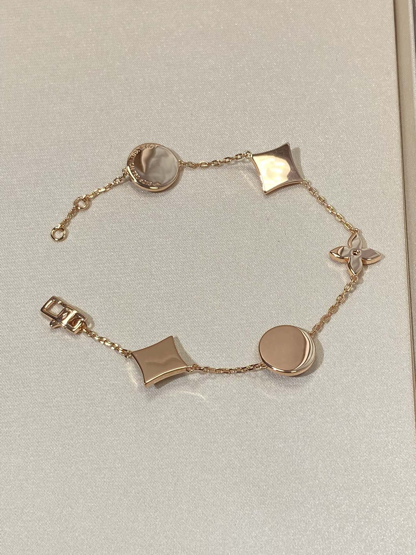 [Luxery]STAR AND SUN 5 MOTIF MOP PINK GOLD BRACELET