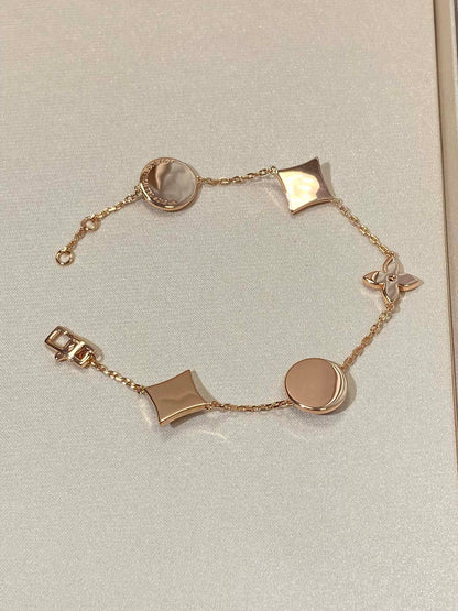[Luxery]STAR AND SUN 5 MOTIF MOP PINK GOLD BRACELET