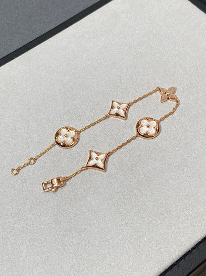 [Luxery]STAR AND SUN 5 MOTIF MOP PINK GOLD BRACELET